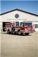 Fire Engine 62 in front of Fire Station