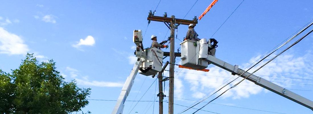 Men Repairing Power