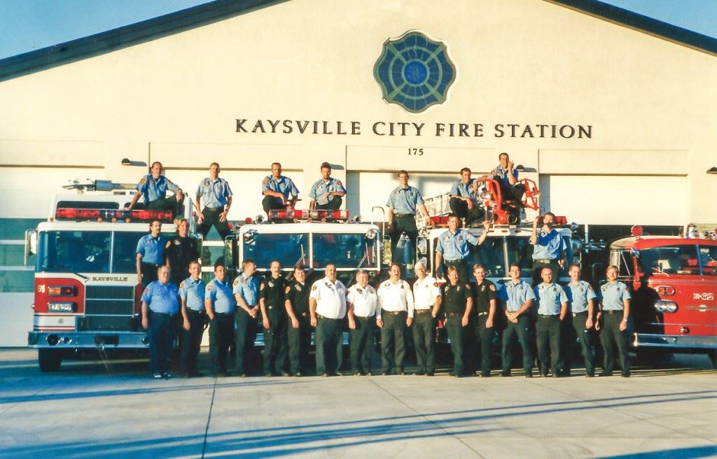 Fire Fighters posing in front of Fire Department