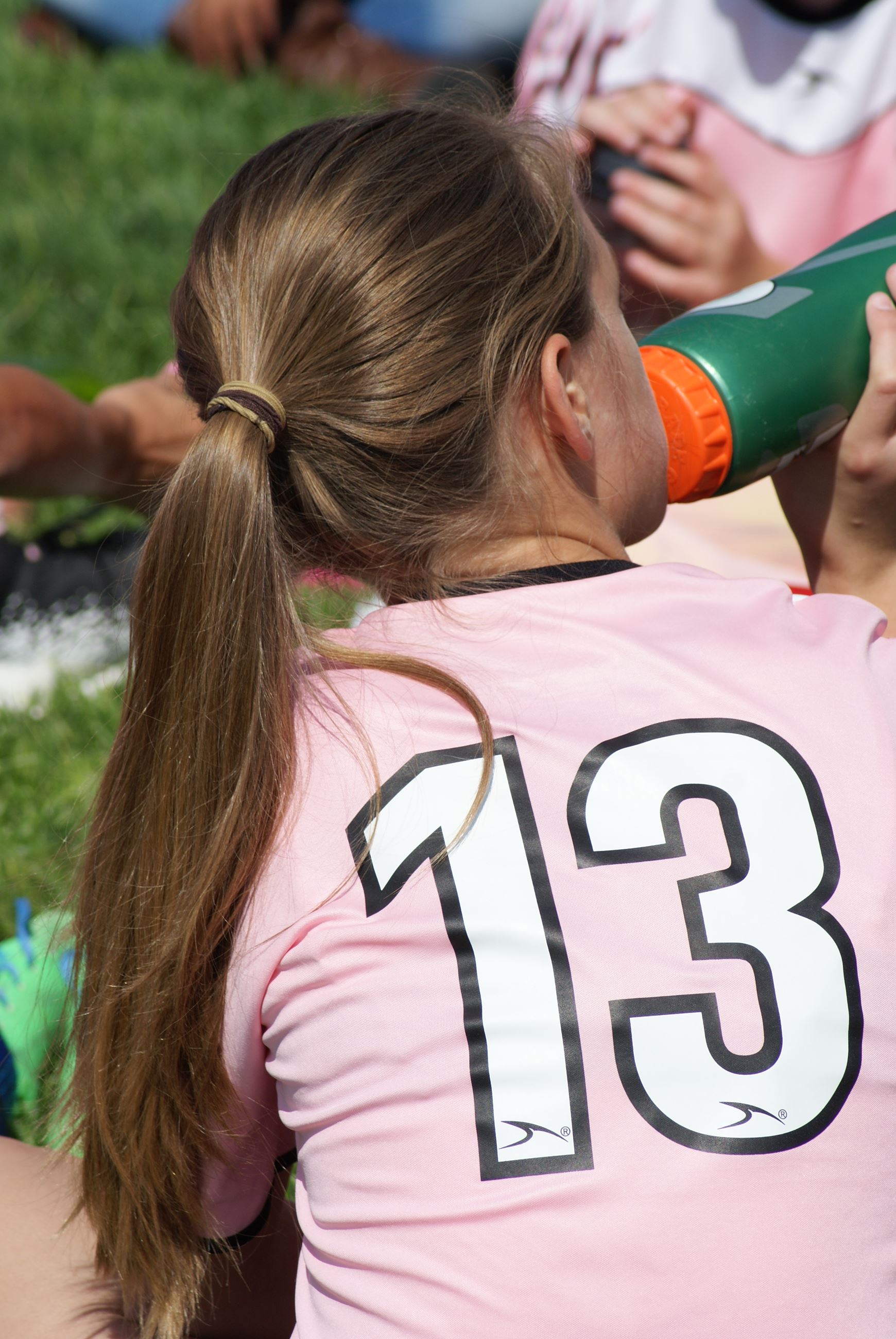 Girl with number 13 her back